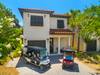 Front of Home & Two Golf Carts