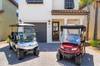 Front of Home & Two Golf Carts