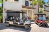Front of Home & Two Golf Carts
