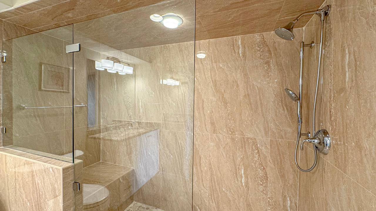 Large Tiled Walk-in Shower with Dual Handheld Shower Head 