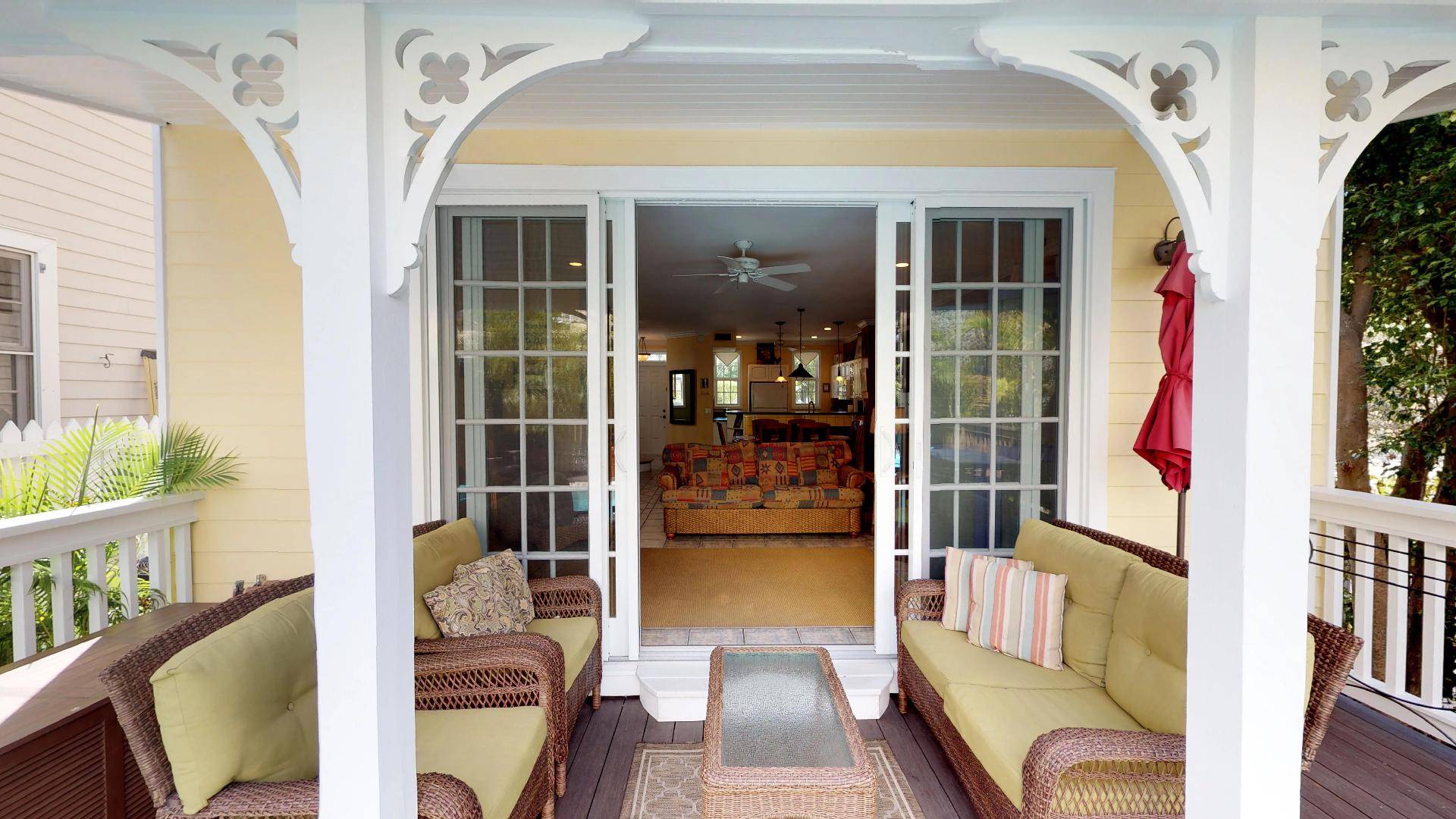 French doors lead to outdoor covered lanai