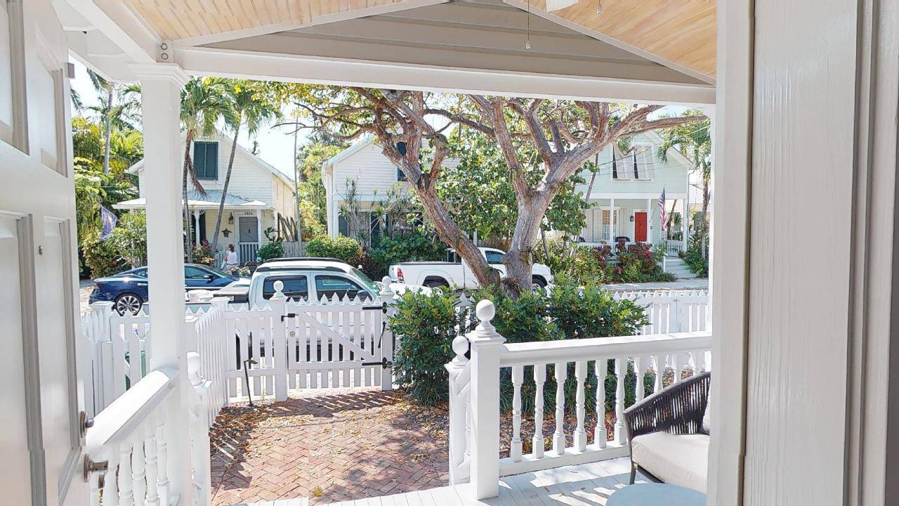 Fenced front yard and porch