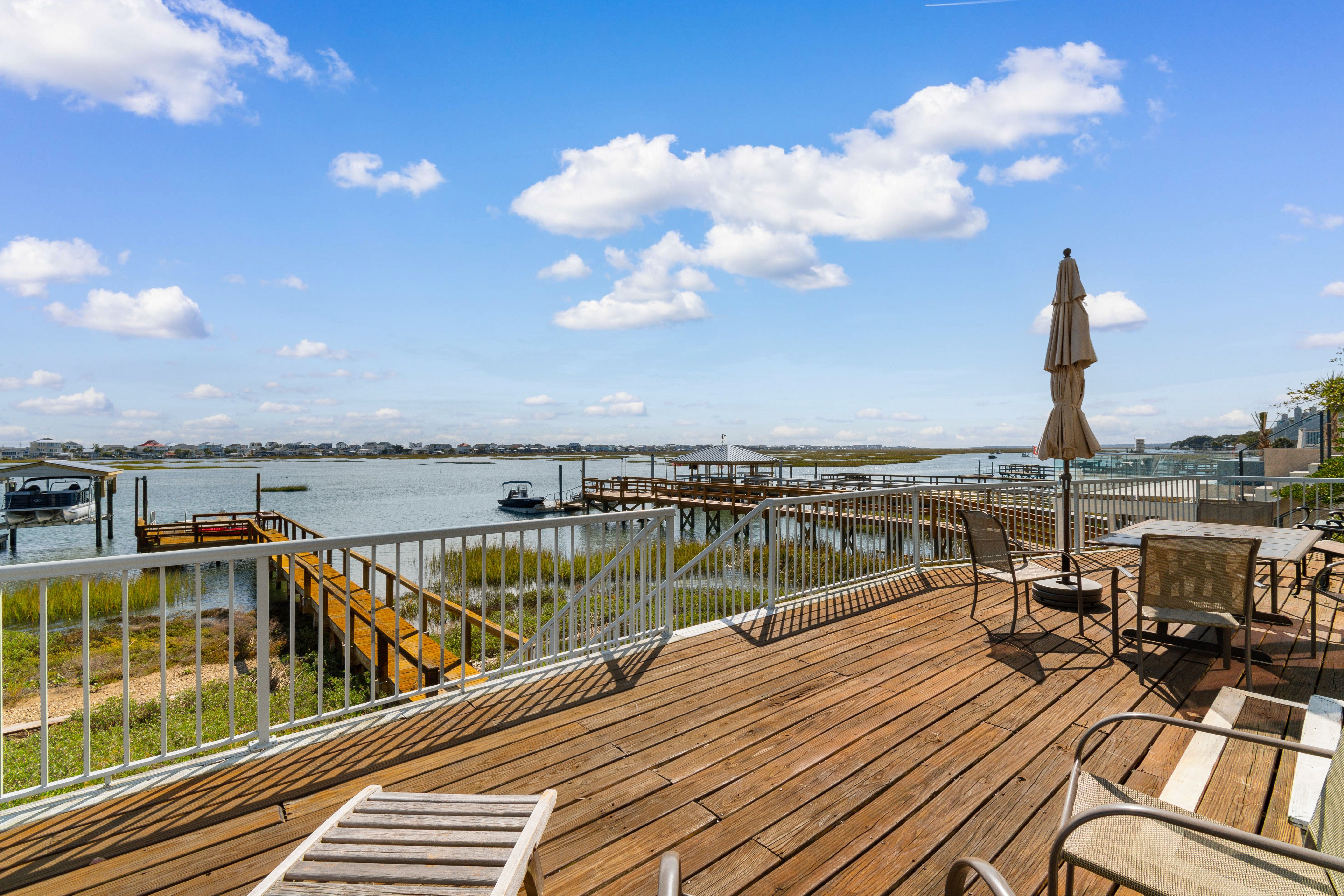 Inlet front porch off the first floor with direct dock access 