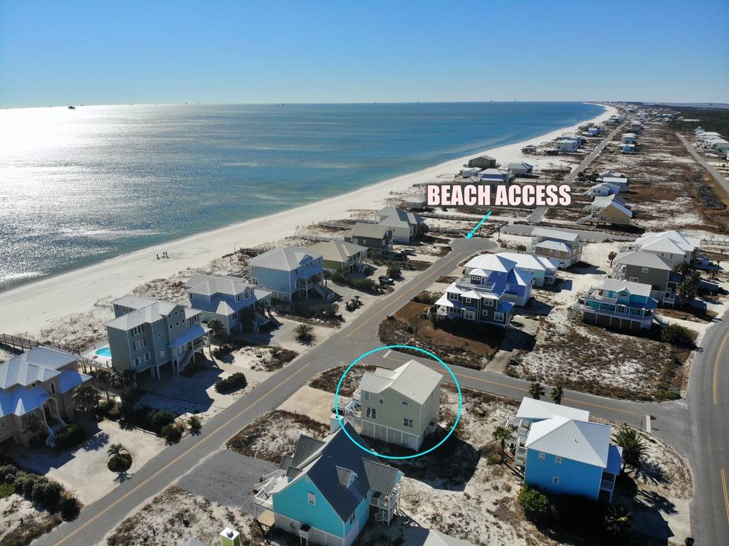 Beach access is just a few houses down