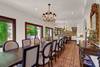 11 DINING ROOM TO KITCHEN - Oranj Palm Vacation Homes.jpg