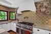 14 KITCHEN COOKTOP DETAIL - Oranj Palm Vacation Homes.jpg