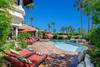 3 CHAISES TO POOL AND SPA FROM BUILT IN BBQ AREA - Oranj Palm Vacation Homes.jpg
