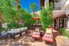 45 CHAISES TO BUILT IN BBQ AND MOUNTAINS - Oranj Palm Vacation Homes.jpg