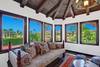 18 MASTER BEDROOM SITTING ROOM TO WRAP AROUND VIEW - Oranj Palm Vacation Homes.jpg