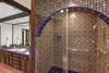 25 MASTER SHOWER AND VANITY - Oranj Palm Vacation Homes.jpg