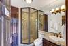 52 TENNIS COURT BATHROOM - Oranj Palm Vacation Homes.jpg