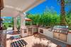 45 OUTDOOR BUILT IN BBQ AREA - Oranj Palm Vacation Homes.jpg