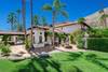 48 FRONT YARD TO HOUSE AND MOUNTAINS - Oranj Palm Vacation Homes - Copy.jpg
