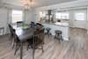 Kitchen with bar and dining room