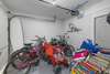 Bikes, beach cart, beach chairs and more in the attached garage.