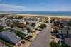 Aerial View of the home (red arrow) along with the beach access
