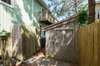 Gate into enclosed backyard