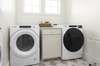 Laundry room with Two Sets of Washers and Dryers