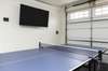 Garage for entertaining with a flat screen TV.