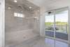 Primary bedroom en suite with huge double headed shower