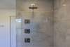Primary bedroom en suite with huge double headed shower