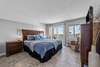 Bedroom with balcony overlooking marina