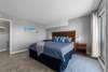 Bedroom with balcony overlooking marina