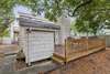 Spacious backyard deck with Shed where you will find beach chairs and a umbrella.