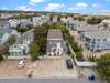 Front aerial view (left side of the driveway is designated for this property)