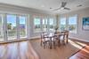 One of two dining tables with ocean views