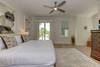 Bedroom 5 with king bed on first floor