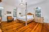Bedroom 6 with king bed on first floor