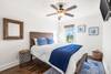 Third floor Guest Queen Bedroom with Flat Screen TV has access to the shared hallway bathroom