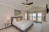 Bedroom 3 on second floor with king bed and ocean views