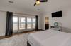 Bedroom 5 on second floor with king bed and ocean views