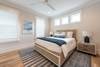 Bedroom 3 with queen bed on first floor