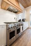 Gas stove with double ovens