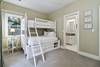 Great bedroom space for the kids with twin over full bunk bed, TV, and private bathroom