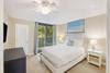Bedroom 2: Queen, TV, Semi-Private Bathroom, Private Balcony