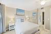 Bedroom 2: Queen, TV, Semi-Private Bathroom, Private Balcony