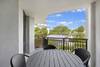 Balcony with seating and table