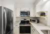 Beautifully upgraded kitchen with stainless appliances