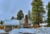 Snow covered Big Bear Cool Cabins Bear Family Cabin front
