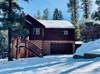 Snow covered Big Bear Cool Cabins Bearfoot Bungalow front