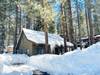 Snow covered Big Bear Cool Cabins, Bear Claw Inn