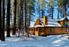 Snow covered Big Bear Cool Cabins, Ridenour Retreat front