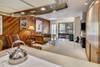 View from kitchen over main living space with Murphy bed stored