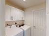Laundry Room with Full Size Washer and Dryer (Laundry Detergent Not Provided)