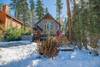 Snow covered Big Bear Cool Cabins, Silver Pine Lodge front
