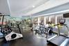 Fitness center with enough equipment to fulfill all of your workout needs